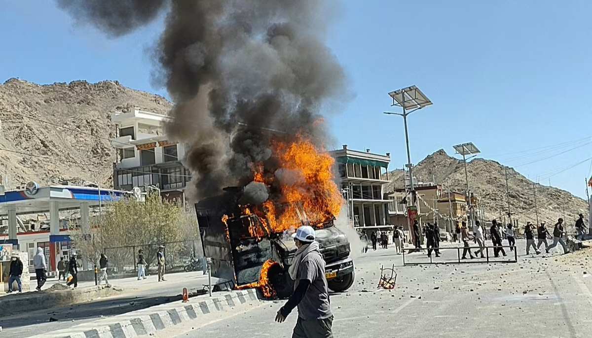 A vehicle is set on fire during a protest by locals demanding statehood for the federal territory and job quotas for local residents in Leh, in the Ladakh region, India, September 24, 2025. — Reuters