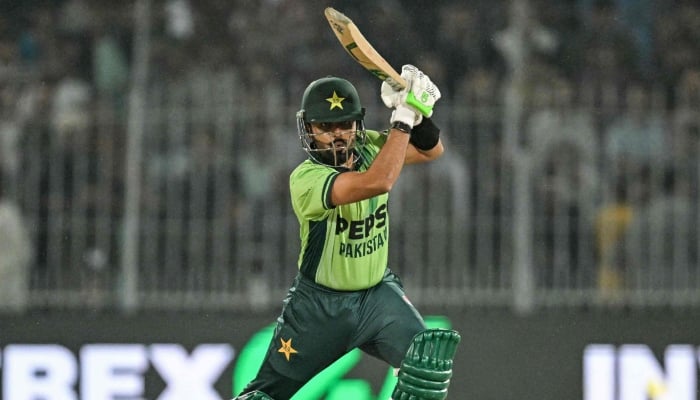 Pakistans Babar Azam plays a shot during their third ODI against South Africa at the Iqbal Stadium in Faisalabad on November 8, 2025. — AFP