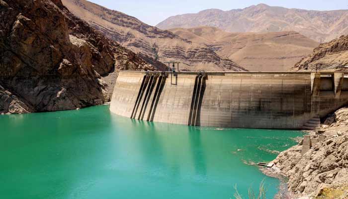 Diminished water levels are pictured in the reservoir behind the Amir Kabir dam along the Karaj river in Irans northern Alborz mountain range on June 1, 2025.— AFP