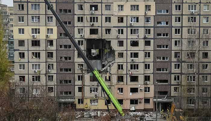 A crane works where several residential units have collapsed after an apartment building was hit during a Russian drone strike, amid Russias attack on Ukraine, in Dnipro, Ukraine November 8, 2025. — Reuters