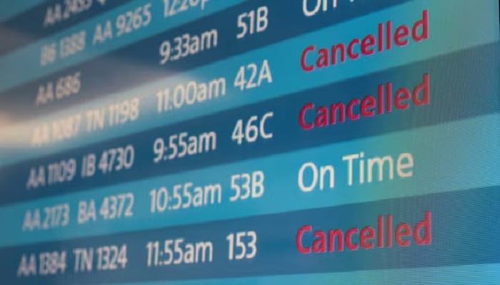 A screen showing cancelled flights is seen at Los Angeles International Airport as more than 1,400 American Airlines flights over the weekend were cancelled due to staff shortages and unfavourable weather in Los Angeles, California, US, October 31, 2021.—