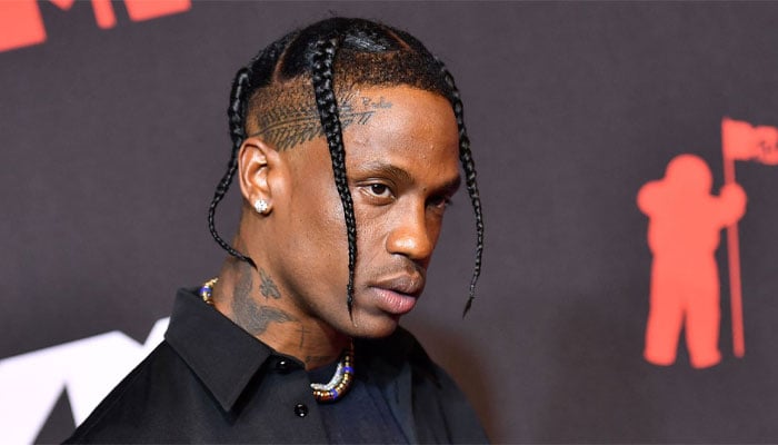 Travis Scotts daughter joins him on Tokyo stage midperformance