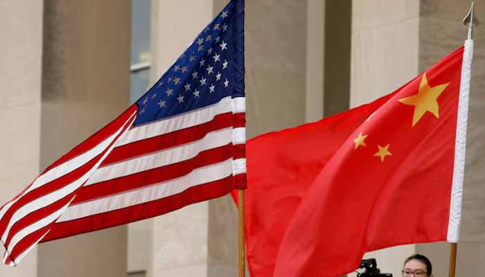 US and Chinese flags are seen before a meeting between senior defence officials from both countries at the Pentagon in Arlington, Virginia, US, November 9, 2018. Reuters