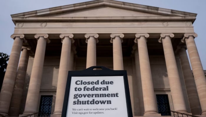 Signage warning of closures due to the US Government shutdown in front of the National Gallery of Art, more than a month into the continuing US government shutdown in Washington, DC, US, November 7, 2025.