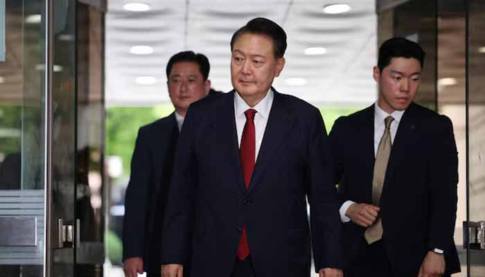 Former South Korean President Yoon Suk Yeol arrives at a court to attend a hearing to review his arrest warrant requested by special prosecutors in Seoul, South Korea, July 9, 2025