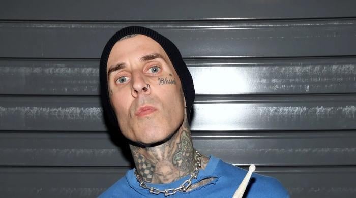 Travis Barker opens up about son Rocky 13 choosing guitars over drums