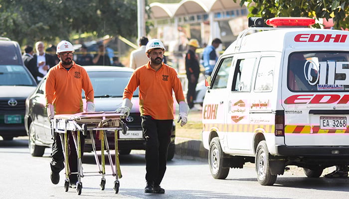 Rescue workers move an stretcher after a blast outside a court building in Islamabad, November 11, 2025. — Reuters