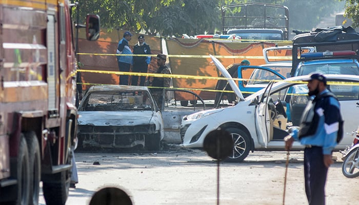 A police officer stands at the site of a blast outside a court building in Islamabad on November 11, 2025. — Reuters