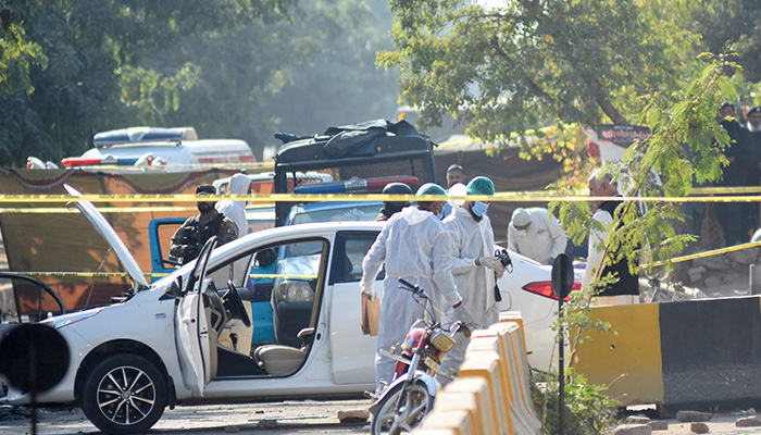 Members of the forensic team work after a blast outside a court building in Islamabad, November 11, 2025. — Reuters