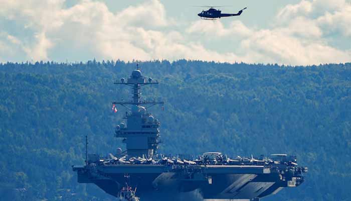 The worlds largest warship, US aircraft carrier USS Gerald R Ford, on its way out of the Oslofjord at Nesodden and Bygdoy, Norway, September 17, 2025.— Reuters