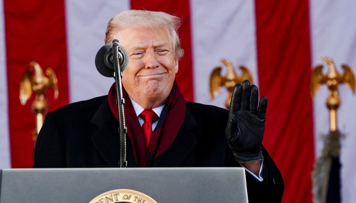 US President Donald Trump waves to the audience during a Veterans Day ceremony at Arlington National Cemetery in Arlington, Virginia, US, November 11, 2025. — Reuters