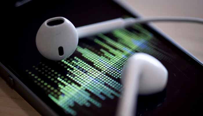 This undated image shows an audio podcast being played on a smartphone. — AFP