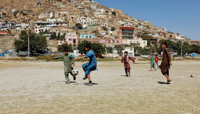 Afghan children play football in a playground in Kabul, Afghanistan, September 10, 2024. — Reuters