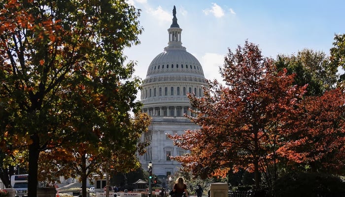 The US Capitol building is framed between trees with fall foliage, weeks into the continuing US government shutdown, in Washington, DC, US, October 27, 2025. — Reuters
