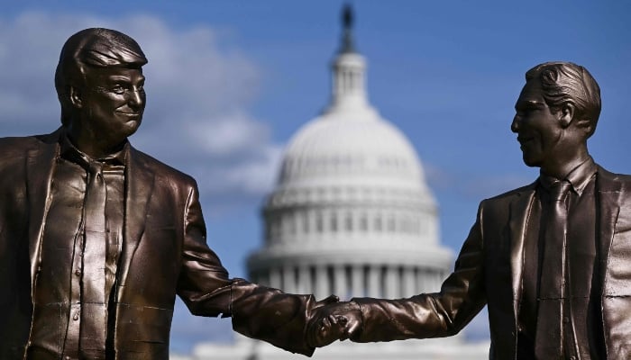 A statue depicting US President Donald Trump and Jeffrey Epstein holding hands is seen near the US Capitol on October 2, 2025, in Washington, DC, US. — AFP
