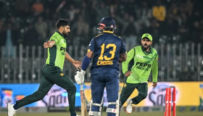 Pakistan’s Haris Rauf and Babar Azam celebrate a wicket during their first ODI against Sri Lanka, Rawalpindi, November 11, 2025. — AFP