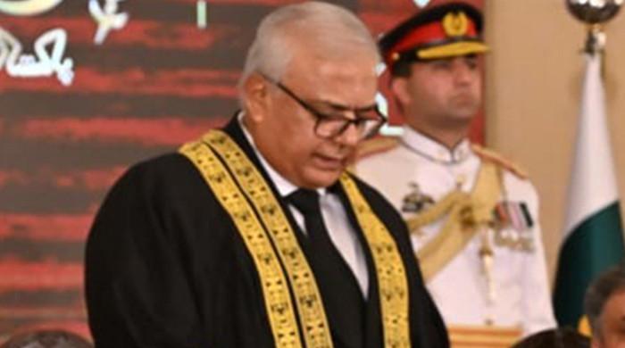 Who is Justice Aminuddin Khan, first CJ of newly formed FCC?