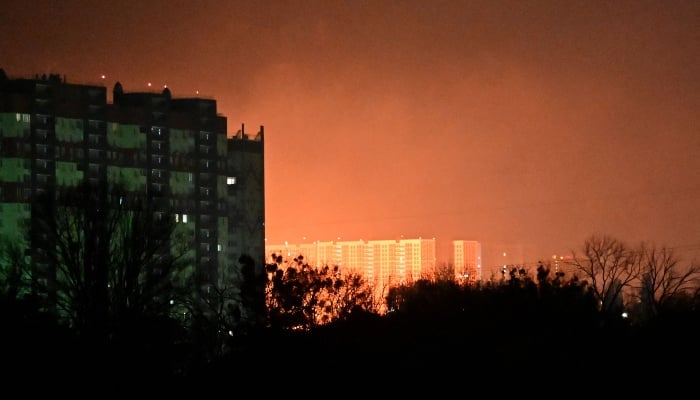 This photo shows the glow from explosions above Kyiv, Ukraine, during drone and missile strikes on November 14, 2025. — AFP
