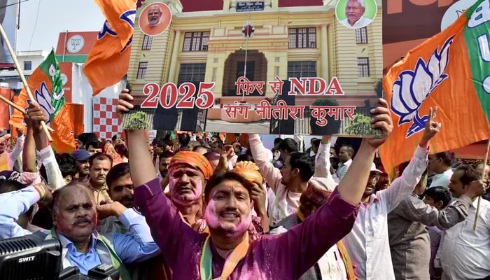 Bharatiya Janata Party (BJP) supporters celebrate as early trends show the ruling National Democratic Alliance leading in the Bihar state assembly election results, in Patna, India, November 14, 2025. — Reuters