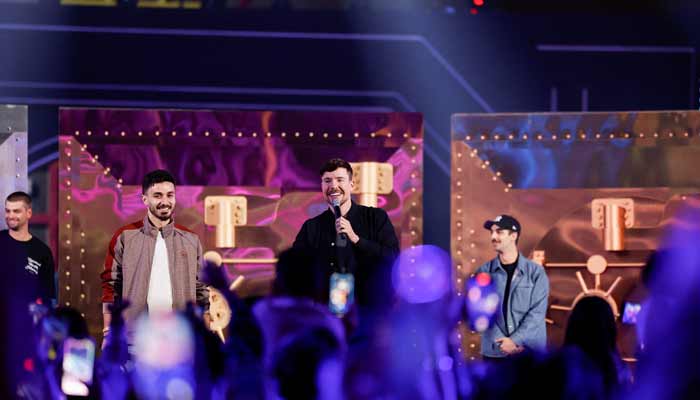 Jimmy Donaldson, known as MrBeast and currently the worlds most popular YouTuber, speaks on stage during the opening day of Beast Land, a theme park modelled, in Riyadh, Saudi Arabia, on November 13, 2025. Reuters