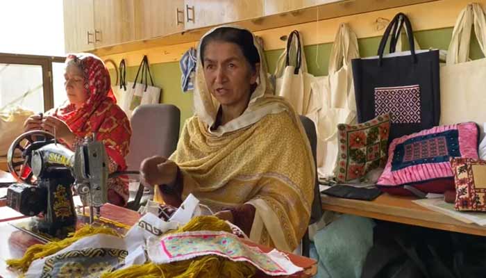 Khushan Bano, an intellectually disabled woman, earns her livelihood through hand embroidery while helping preserve her cultural heritage.— Reporter