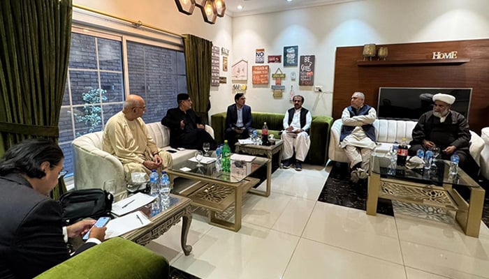 Tehreek Tahaffuz-e-Ayeen-Pakistan head Mahmood Khan Achakzai (second from left) chairs a session of the opposition alliance in Rawalpindi on November 14, 2025. — Reporter