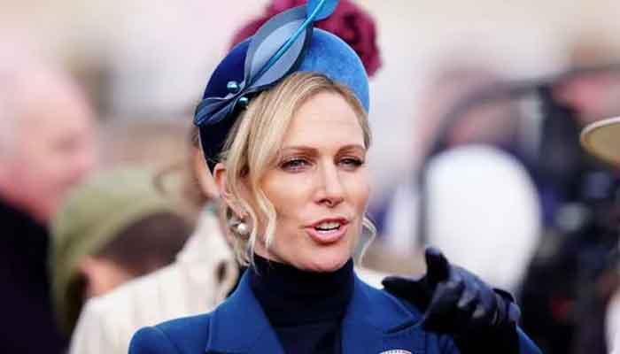 Storm Claudia leaves Zara Tindall struggling with her hat