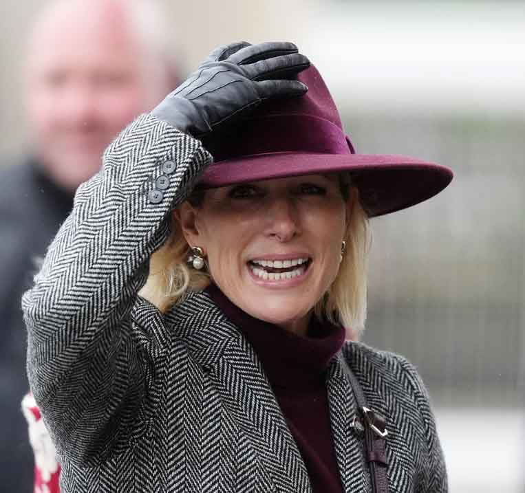 Storm Claudia leaves Zara Tindall struggling with her hat