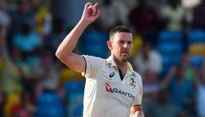 Josh Hazlewood of Australia celebrates the dismissal of Jomel Warrican of West Indies during the 1st day of the 1st Test match between West Indies and Australia at Kensington Oval, Bridgetown, Barbados, on June 25, 2025. - AFP