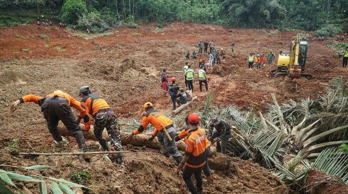 Landslide in Indonesia Central Java kills six, search continue for 17 missing
