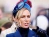 Storm Claudia leaves Zara Tindall struggling with her hat 