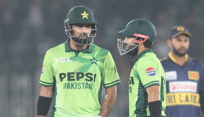 Pakistans Mohammad Rizwan and Hussain Talat chat during their third ODI against Sri Lanka at Rawalpindi Cricket Stadium on November 16, 2025. – PCB