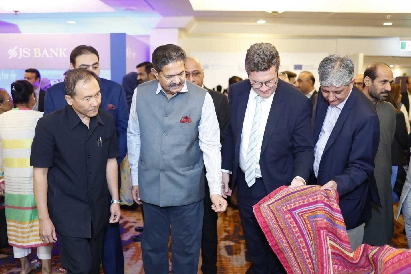 The Consul General of Germany Thomas H Schultz, SACM Sindh Rajvir Singh and Coordinator UNIDO, Badar ul Islam  visiting stalls at Shevolution 2.0. — PAIDAR Sindh
