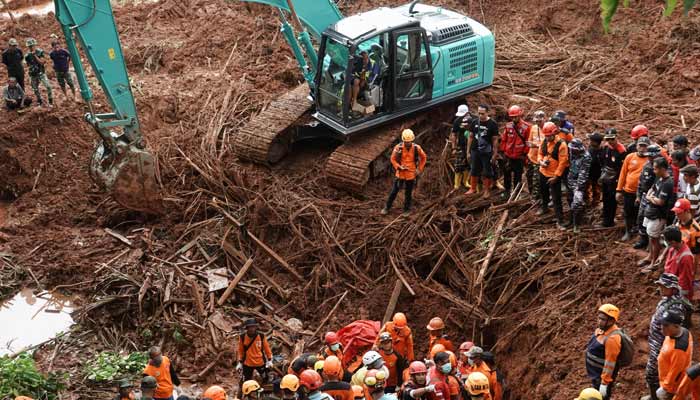 Indonesian rescue members search for victims at the site of a landslide, which hit Cibeunying village on November 13, in Cilacap, Central Java province, Indonesia, November 15, 2025. — Reuters