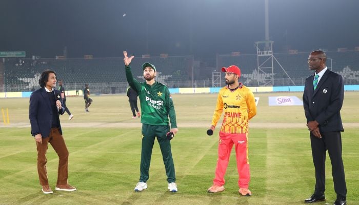 Pakistan captain Salman Ali Agha (left) and Zimbabwe’s Sikandar Raza at the toss before their T20I tri-series match at Rawalpindi Cricket Stadium on November 18, 2025. – PCB