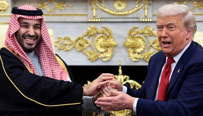 US President Donald Trump and Saudi Crown Prince and Prime Minister Mohammed bin Salman hold hands during a meeting in the Oval Office at the White House in Washington, DC, US, November 18, 2025. — Reuters