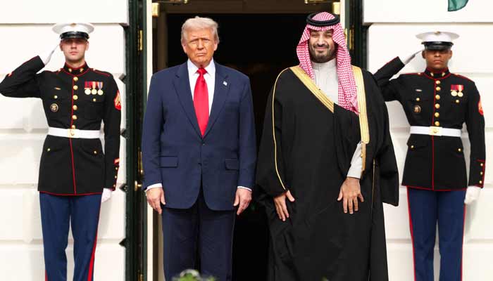 US President Donald Trump stands next to Saudi Crown Prince and Prime Minister Mohammed bin Salman during an arrival ceremony on the South Lawn of the White House in Washington, DC, US, November 18, 2025. —Reuters