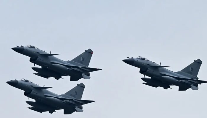 Pakistan’s Air Force flying J-10C fighter jets during a parade rehearsal in Islamabad. — AFP/File