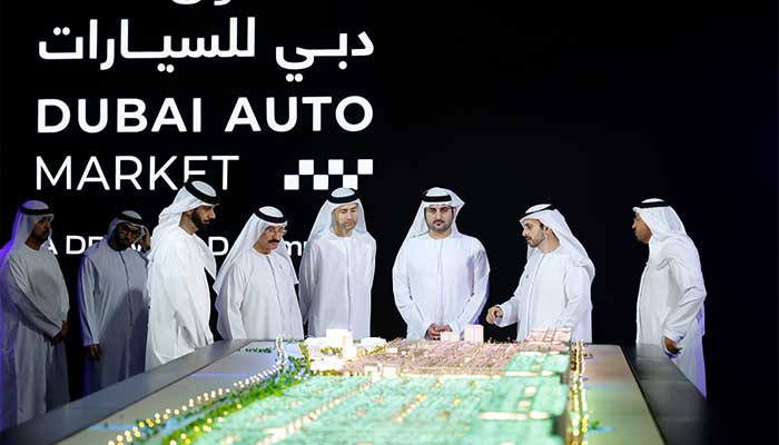 Deputy Ruler of Dubai and Minister of Finance Maktoum bin Mohammed (third from right) witnesses launch of Dubai Auto Market development project. — X/@DXBMediaOffice