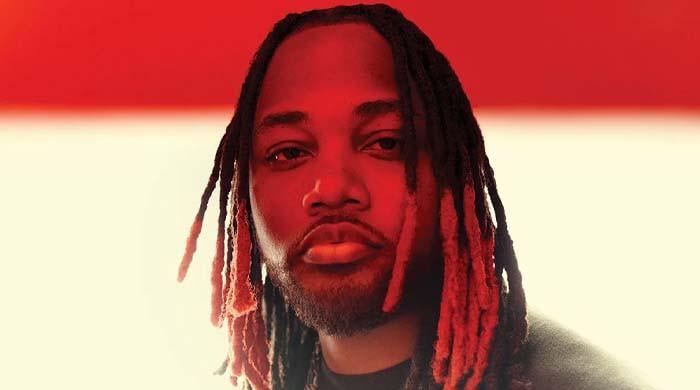 Leon Thomas reacts hilariously to fight during his concert