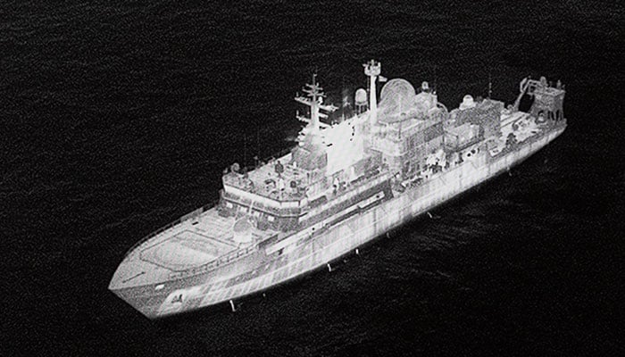 An image of the Russian spy ship Yantar which is operating off the northern coast of Scotland, is shown on a screen during Defence Secretary John Healeys speech at No 9 Downing Street in central London. — Reuters