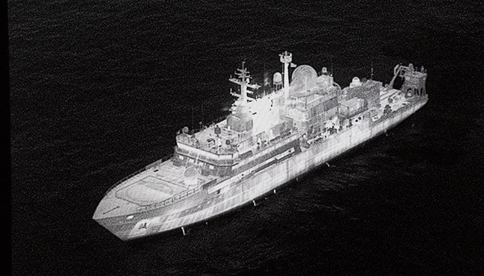 An image of the Russian spy ship Yantar which is operating off the northern coast of Scotland, is shown on a screen during Defence Secretary John Healeys speech at No 9 Downing Street in central London. — Reuters