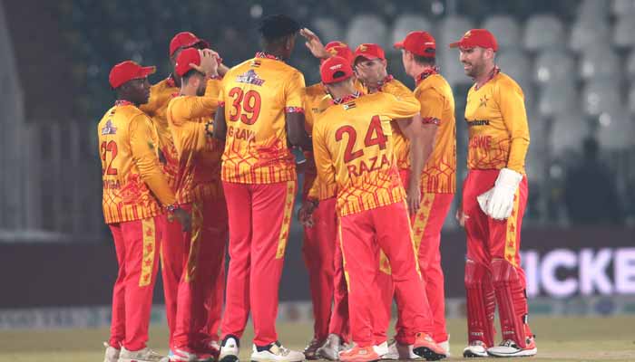Zimbabwe players celebrate taking a wicket during their T20I tri-series match against Sri Lanka at the Rawalpindi Cricket Stadium in Rawalpindi on November 20, 2025. — PCB