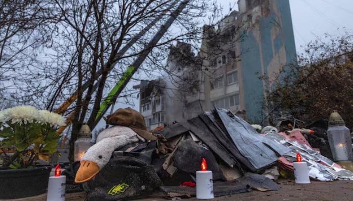 Electric candles glow at a makeshift memorial in front of an apartment building that was hit yesterday by a Russian missile in Ternopil, Ukraine November 20, 2025. — Reuters