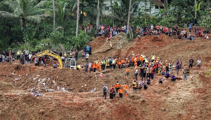 Indonesian rescue members search for victims at the site of a landslide, which hit Cibeunying village on November 13, in Cilacap, Central Java province, Indonesia, November 15, 2025. — Reuters