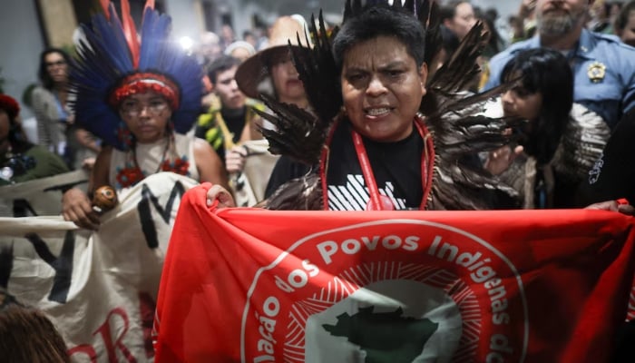 People take part in the Peoples Plenary at the UN Climate Change Conference (COP30), in Belem, Brazil, November 21, 2025. — Reuters
