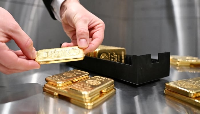 Gold bars are stacked in the safe deposit boxes room of the Pro Aurum gold house in Munich, Germany, January 10, 2025. — Reuters