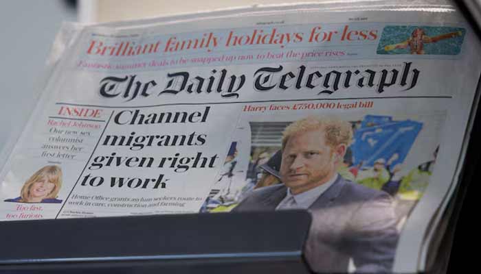 Copies of The Daily Telegraph are displayed on a rack in a supermarket in London, Britain, January 20, 2024.— Reuters