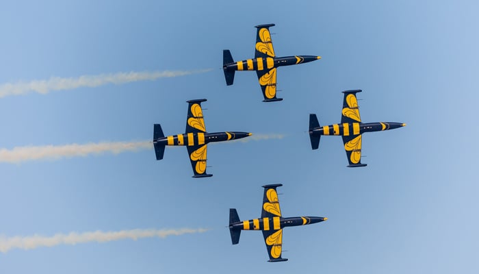 Aircraft perform aerobatic manoeuvres at the Dubai Airshow 2025. — X/@DubaiAirshow