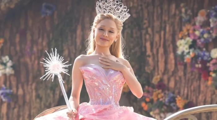 'Wicked' writer explains Ariana Grande's Glinda, Grimmerie moment 